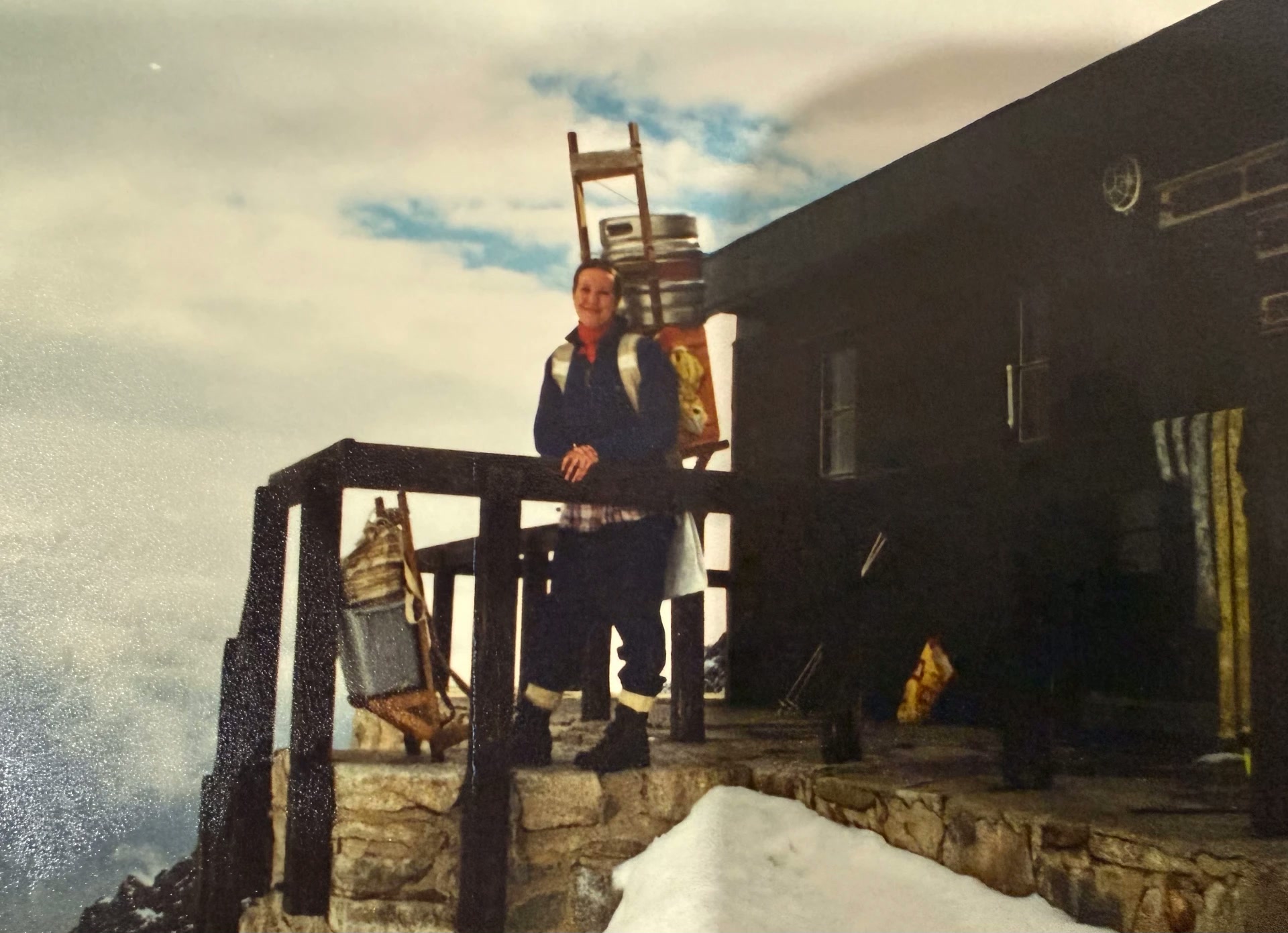 Mountain porter with traditional carrying equipment at Téryho chata in the High Tatras